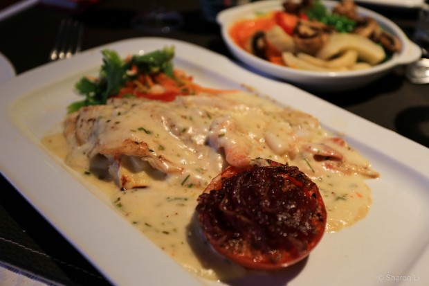 my dish: a trout stuffed with veggies in a seafood sauce